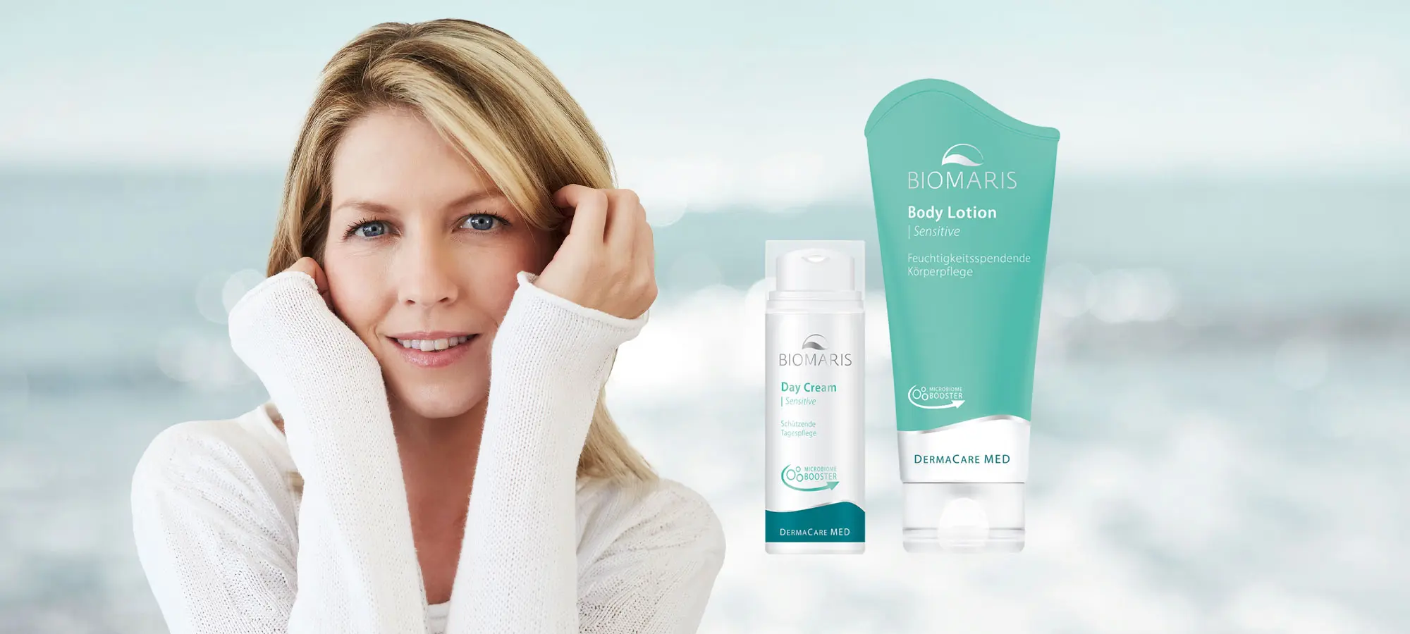 Frau in weißem Pullover, daneben BIOMARIS DermaCare MED Body Lotion und Day Cream für empfindliche Haut