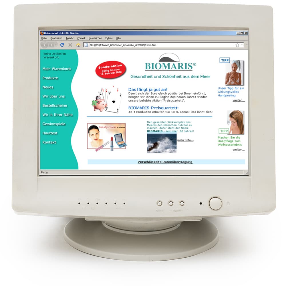 Röhrenmonitor zeigt den ersten BIOMARIS-Online-Shop aus dem Jahr 1996 mit Menüleiste, Produktbildern und Aktionshinweisen.